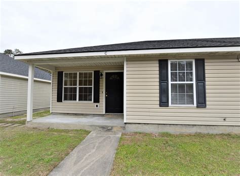 This lovely house offers a comfortable living space with beautiful wood floors throughout, creating a warm and inviting atmosphere. . Homes for rent valdosta ga